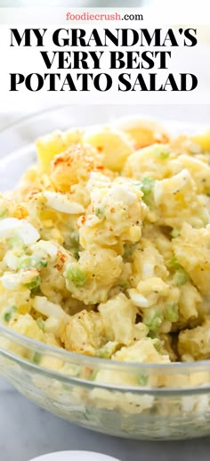 a bowl filled with potato salad on top of a table