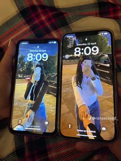 two iphones showing the same image as they are being used to take selfies