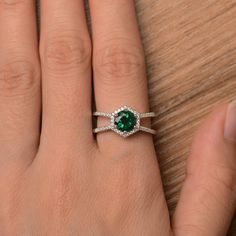 It is a lab emerald ring. The main stone is 7mm*7mm round cut, weight about 1.3 carats. The basic metal is sterling silver and plated with rhodium. To change the metal to a solid gold (white/rose) or platinum is also available, please ask for a quotation if you want. You can also go to my shop Home for more elegant rings: https://www.etsy.com/shop/godjewelry?ref=hdr_shop_menu More lab emerald rings: https://www.etsy.com/shop/godjewelry?ref=seller-platform-mcnav&section_id=20709240 Customizat Silver Engagement Rings Round, Engagement Ring Round Cut, Emerald Halo, Elegant Rings, May Birthstone Rings, Engagement Ring Round, Emerald Rings, Silver Engagement Ring, May Birthstone