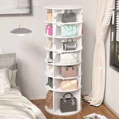 a white shelf with purses and handbags on it in the corner of a bedroom