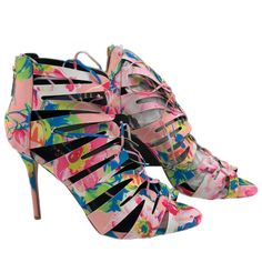 Step Into A World Of Color And Style With These Stunning Kendall & Kylie Heels. With A Vibrant Floral Pattern That Pops Against The Pink And Blue Hues, These Shoes Are Sure To Turn Heads Wherever You Go. The Lace-Up Closure Adds A Trendy Touch, While The Open Toe Design Lets You Show Off Your Latest Pedicure. Perfect For Any Season And Any Occasion, These Heels Are A Must-Have Addition To Your Shoe Collection. Features: - Vibrant Floral Pattern For A Standout Look - Lace-Up Closure For A Secure Spring Lace-up 4-inch Heels, Multicolor Fitted Heels For Spring, Spring Multicolor Fitted Heels, Multicolor Strappy Sandals For Spring, Multicolor Open Heel Spring Heels, Multicolor Open Heel Heels For Spring, Pink 4-inch Heel Lace-up Heels, Pink Lace-up Heels With 4-inch Heel, Pink High Heels For Spring