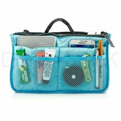 a blue purse filled with lots of items