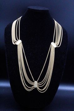 "DESCRIPTION: This is a stunning vintage necklace/belt from the 80s, perfect for adding a touch of glamour to any outfit. The piece is crafted entirely of textured gold plate and designed in a multi-chain manner. It is a festoon piece, with the chains cascading down in a beautiful and elegant way. This necklace/belt is in mint condition and has a hook clasp for secure closure. Measuring 35\" long by 1\" wide, it can be worn as a necklace or a belt, making it a versatile addition to your jewelry Belt Making, Heart Dangle Earrings, Belly Chain, Lovely Ring, Hook Clasp, Body Jewellery, Gems Jewelry, Gold Texture, The 80s