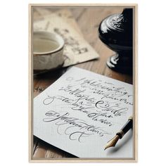 Bring timeless elegance to your space with this stunning vintage-inspired wall art. Featuring a beautifully arranged calligraphy desk scene, complete with an ornate ink bottle, a classic pen, and handwritten script, this artwork captures the charm and artistry of traditional writing. Ideal for adding a touch of sophistication to offices, libraries, or creative spaces. Crafted on high-quality canvas, this artwork is available in framed or unframed options to suit your style. Choose from black, natural wood, or gold frames for a polished look. Perfect as a focal point in your home or a thoughtful gift for a writer or artist, this wall art blends seamlessly with vintage or rustic decor. Available in three versatile sizes, this timeless design ensures the perfect fit for any space. Enjoy free Vintage Calligraphy, Vintage Inspired Wall Art, Writer Gifts, Ink Bottle, Gold Frames, Wall Art Rustic, Rustic Frames, Creative Spaces, Creative Space