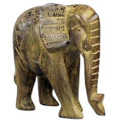 an elephant statue is shown on a white background