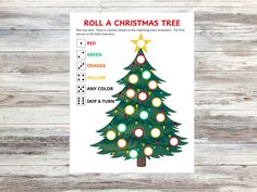 a christmas tree with lights is shown on a wooden background and has the words roll a christmas tree below it