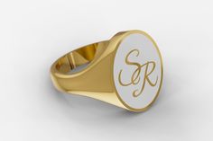 Embrace timeless elegance with our Oval Shaped Signet Ring in Gold Vermeil. Crafted from durable 925 Sterling Silver and bathed in radiant gold vermeil, this ring boasts an impressive lustre. The central feature, an oval face, is expertly engraved with intricately intertwined initials, surrounded by white enamel, giving this piece a unique, personal touch. Oval Signet Ring, Tie Bar Clip, Signet Rings, Oval Face, Oval Faces, White Enamel, Signet Ring, Gold Vermeil, Personal Touch