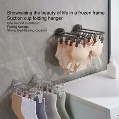 Description: Introducing the innovative Folding drying rack, a space-saving solution for your drying needs. This rack can be conveniently folded upward at 90 degree when not in use, making it ideal for home, balcony, dormitory, bathroom, wardrobe, bedroom, and more. Crafted from preferred thick material, this durable rack measures 26.6*9.5*11.4cm, providing ample space for your laundry items. The rack features a suction cup design, allowing for easy installation without the need for drilling hol Folding Socks, Folding Clothes Rack, Towel Clothes, Folding Hanger, Tie Rack, Hanger Clips, Hanger Home, Clothes Drying, Clothes Drying Racks