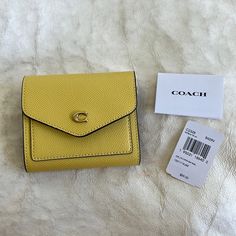 Coach Wyn Small Wallet In Retro Yellow, New With Tags, Color Is No Longer Available Coach Wyn Wallet, Coach Bifold Coin Purse With Card Slots, Coach Bifold Wallet As Gift, Compact Coach Wallet As Gift, Coach Bifold Coin Purse Gift, Coach Wallet With Coin Pocket As Gift, Coach Wallet With Coin Pocket For Gift, Envelope Wallet With Coin Pocket, Coach Rectangular Trifold Wallet With Coin Pocket