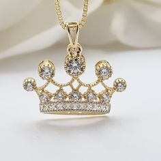 Stunning Solid 14k Yellow Gold 3d Crown Charm Necklace. Get The Set Or Just The Pendant. Perfect For Everyday And Every Occasion. Unique, Elegant And Everlasting. 14k Gold Will Not Tarnish Or Rust. Perfect Gift For Her. Materials: 14k Gold, Cz Size: 19x14mm Pendant Weight: 1.6 Grams (Aprox) Chain Weight: 2 Grams (Aprox) Chain Thickness: 0.9x0.9mm Lenght: 18 Inches 14k Stamped Brand New Fast Shipping For Her Follow Us For More Fine 14k Gold Jewelry Dm Me With All Your Questions I Will Be Happy To Luxury 14k Stamped Cubic Zirconia Jewelry, Rose Gold Diamond Jewelry With Crown Design, Luxury Yellow Gold Crown-shaped Jewelry, Luxury Yellow Gold Crown Jewelry, Formal Rose Gold Jewelry With Crown Design, Yellow Gold Jewelry With Box Chain And Cubic Zirconia, Yellow Gold Cubic Zirconia Jewelry With Box Chain, 14k Gold Crown Design Fine Jewelry, Fine Jewelry Diamond Crown Design