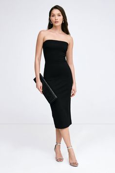 When sleek is spectacular. Our strapless midi Natalia Dress is the versatile LBD you’ve been waiting for, now in an updated no-slip design. Our soft, structured and mid-stretch European ponte fabric lined with soft mesh gives her a smoothing fit, while her sleek silhouette makes Natalia effortless to dress up or down. Wear her to date-night cocktails just as easily as you might to run around the corner—Natalia will go everywhere with you. | Yada, in black, is 5'9" (175 cm) tall, wearing size XS. Ponte Fabric, Black Midi, Winter Clothing, Around The Corner, Fitted Dress, Fall And Winter, Dress Making, Red Dress, Sydney