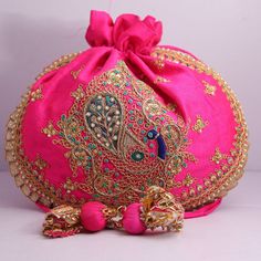 "Peacock Indian potli bag, hand embroidery, handmade, bridal potli, wedding bag, designer potli, handbag Material:Silk, Golden Tread, Golden Sequins, Motifs Color: Pink, Off White, Green Package Contents: As per quantity purchased Size: 10\" x 8\" Designed with the heart, this beautiful Potli or batawa bag are eye catchy and made of premium material. Key Features: Embroidery art work(zardosi work) This potli is good match with both Indian and western outfits and are superb for wedding and festiv Diwali Dori Work Potli Pouch Bag, Elegant Embroidered Potli Bag For Navratri, Elegant Navratri Potli Bag With Gota Work, Bollywood Style Potli Bag With Gota Work For Diwali, Embroidered Bags For Wedding And Navratri, Festive Zari Work Potli Bag, Diwali Handwork Pouch Potli Bag, Festive Gota Work Pouch Potli Bag, Diwali Handwork Potli Pouch Bag