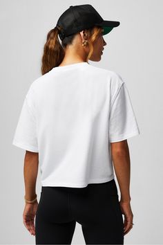 100% Cotton Boxy Tee Fabletics white female Activewear >> Womens >> Tops >> Short Sleeve T-Shirts >> Short-Sleeve Top 100% Cotton regular Everyday Trendy White Tops For Loungewear, Trendy White Loungewear Tops, Sporty Boxy Fit Top For Summer, Athleisure Boxy Fit Workout Tops, Boxy Fit Athleisure Tops For Workout, White Cotton Workout Tops, White Short Sleeve Activewear For Everyday, White Comfortable Fit Athleisure Top, Trendy White Cotton Activewear