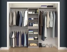 an organized closet with clothes and shoes