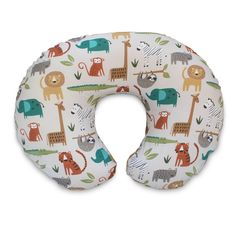 a white neck pillow with various animals and plants printed on the front, along with an inner tube for support