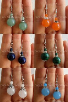 six different colors of beads hanging from the same chain as if they were dangling on an individual's finger