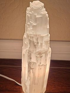 These lamp towers are huge! 8 - 16" lamps to choose from, some of the largest authentic selenite lamps you can find at the best price! Each lamp comes with a light bulb and plug-in cord with on/off switch. These are GREAT for purifying and cleansing your home. You have the option to include a rotating color light/stand for your lamp! The rotator changes color automatically and is absolutely gorgeous to look at. Its array of colors include pink, yellow, green, blue, and purple. (As pictured) Sele Cleansing Your Home, Plug In Lamp, Tower Lamp, Selenite Crystals, Selenite Lamp, Lamp Large, Metaphysical Healing, Light Stand, Selenite Crystal