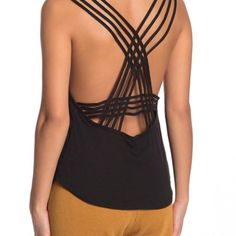 A Strappy Racerback Looks Ultra-Chic On This Sleeveless Valentine Casual Tank Top. - Crew Neck - Sleeveless - Strappy Racerback - Ribbed Trim - Knit Construction Shell: 50% Polyester, 25% Rayon, 25% Cotton Rib: 55% Cotton, 35% Polyester, 10% Rayon Casual Cross Back Tank Top With Built-in Bra, Chic Strappy Back Tie Tank Top, Chic Strappy Back Tank Top With Tie, Chic Strappy Back Tank Top With Tie Detail, Chic Strappy Back Tank Top For Beach, Black Backless Tank Top For Beach, Black Stretch Top With Cutout Back, Black Top With Built-in Bra And Strappy Back, Black Tops With Built-in Bra And Strappy Back