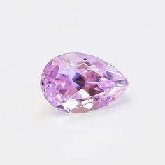 a pink diamond on a white background