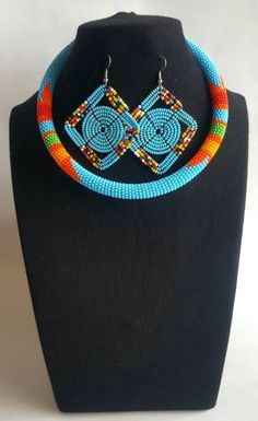 This listing is for a choker necklace with matching earrings. Sizes; 13 inches 14 inches 15 inches 16 inches. **Buy multiple items and pay shipping for 1 item only.The rest ships free. Thank you for visiting! More neckleces here; https://www.etsy.com/shop/TribalTess?ref=seller-platform-mcnav&section_id=21306083 Back to my shop; https://www.etsy.com/shop/TribalTess?ref=seller-platform-mcnav Blue Beaded Choker Necklaces For Festival, Blue Beaded Choker Necklace For Festivals, Handmade Blue Choker For Festivals, Blue Beads Choker Jewelry, Handmade Blue Choker As Gift, Handmade Blue Choker For Gift, Handmade Blue Choker Gift, Traditional Blue Choker With Colorful Beads, Traditional Blue Beaded Choker Necklace