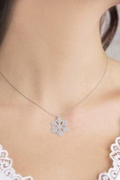 "925 Sterling Silver Small Snowflake Necklace for Women *An exclusive gift jewelry for you and your loved one. Want to add something \"bling\" in winter? This snowflake jewelry will be a GREAT choice for you. And they will be an ideal gift for your girlfriend, wife, fiancee, daughter, mother, your special someone in winter, especially for Christmas or Valentines. * Elegant Design: Beautifully aligned Snowflake-shaped.It features sparkly crystal which will make a timeless accessory to any jewelry Sparkling Snowflake Jewelry For Gifts, Sparkling Snowflake Jewelry In Sterling Silver, Snowflake Shaped Sparkling Sterling Silver Jewelry, Sparkling Snowflake Sterling Silver Jewelry, Sterling Silver Snowflake Jewelry For Anniversary, Diamond White Snowflake Jewelry For Anniversary, Snowflake Cubic Zirconia Jewelry For Anniversary, Cubic Zirconia Snowflake Jewelry For Anniversary, Anniversary Snowflake Cubic Zirconia Jewelry