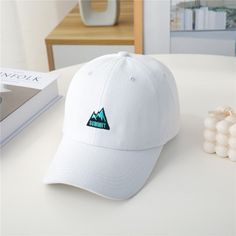 You will find that this baseball cap is a high quality, stylish cap made with high quality materials and is designed to be stylish and comfortable. Trendy White Snapback Hat For Baseball Season, Trendy Baseball Cap With Curved Brim For Outdoor Activities, Trendy Letter Print Snapback Hat For Outdoor, Trendy Snapback Hat With Letter Print For Outdoor, Trendy Outdoor Snapback Hat With Letter Print, White Hip Hop Baseball Cap For Outdoor, Trendy Curved Brim Baseball Cap For Outdoor Activities, White Baseball Cap With Letter Print And Curved Visor, Trendy Curved Brim Baseball Cap For Outdoors