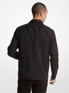 This jacket is designed to make any outfit look sharp, whether you wear it with jeans or tailored pants. The shirt-inspired style is crafted from stretch cotton in a minimalist profile that fastens with a sleek zip closure. A pair of patch pockets come in handy for keeping small items within reach. Wear it with a T-shirt or collared shirt depending on the occasion. Modern Tops With Concealed Placket, Modern Tops With Concealed Placket For Workwear, Modern Workwear Tops With Concealed Placket, Modern Tops For Workwear With Concealed Placket, Modern Long Sleeve Tops With Concealed Placket, Modern Long Sleeve Top With Concealed Placket, Tailored Top With Concealed Placket For Workwear, Modern Collared Tops With Welt Pockets, Sleek Fitted Tops With Concealed Placket