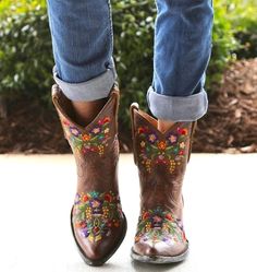 About: The Cowgirl Embroidery Boots are beautifully detailed with colorful floral embroidery etched in pink, purple, teal, orange, yellow and green thread. The 8 inch shaft is the perfect height for sundresses, but the Cowgirl Embroidery Boots will also look amazing with blue jeans. Handcrafters seriously brought these little cowgirl boots to life. If you are looking to make a bold statement, step into the cowgirl boots and you’ll be turning heads for sure. Specs: Fits true to size, take your no Short Cowgirl Boots, Embroidery Boots, Luxury Embroidery, Boots Luxury, Pu Boots, Yellow Shoes, Boot Types, Boots High, Bohemian Rhapsody