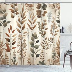 a bathroom with a shower curtain that has leaves on it and a bathtub in the background