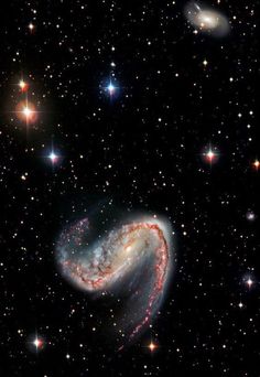 an image of a spiral galaxy in the sky