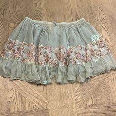 Brand New With Tags Nwt Anthropologie Raga Mini Skirt Blue/Gray Base With A Semi Tie Dye Feel On The Waistband Embroidered Flowers And Beaded Detailing Size Small Elastic Drawstring Waistband 14” Waist With Stretch To 19” Length Approx 14” Tags: Anthropologie Raga Mini Skirt Floral Layered Tiered Float Spring Pastel Boho Chic Bohemian Free People Classic Contemporary Tie Dye Embroidered Beaded Beadwork Rustic Romantic Beaded Mini Skirt, Boho Mini Skirt, Summer Aesthetic Outfit, Eclectic Outfits, Mini Skirt Blue, Clothing Png, Pastel Boho, Skirt Aesthetic, Wardrobe Revamp