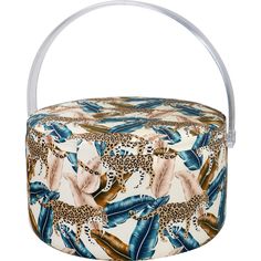 an animal print basket with metal handles