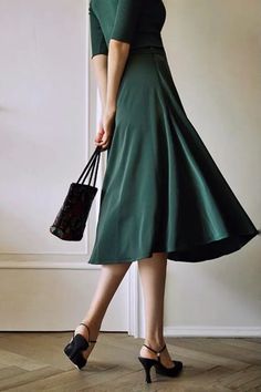 Elegant Green Long Pleated Skirt, Elegant Long Green Pleated Skirt, Elegant Green Pleated Skirt For Summer, Elegant Green Flared Pleated Skirt, Casual Green A-line Bottoms, Green Relaxed Midi Skirt, Elegant Green Summer Skirt, Elegant Green A-line Maxi Skirt, Solid Color Flowy Knee-length Skirt