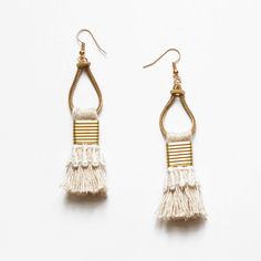 These light weight statement earrings are composed of handmade beige fringe tassels with vintage hand dyed lace and pure brass metal components. A boho tassel earring that is authentically unique. The lace trimming comes in black, white, terracotta (rusty brick), mustard (ochre yellow), beige (sand), Desert rose (dusty pink), magenta (beetroot pink), burgundy (red wine), navy (dark blue), teal (dark turquoise), evergreen (dark emerald) or Dark moss (army green). --------------------------------- Bohemian Handwoven Chandelier Drop Earrings, Bohemian Handwoven Drop Chandelier Earrings, Beach Dangle Chandelier Earrings With Tassels, Bohemian Cream Earrings For Summer, Beige Dangle Earrings For The Beach, Beige Dangle Earrings For Beach, Cream Bohemian Earrings For Summer, Summer Bohemian Cream Earrings, Bohemian Adjustable Macrame Tassel Earrings