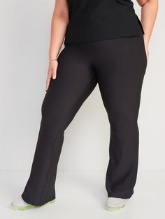 hidden front pocket go-dry wicks moisture extra high waist is 1" higher than standard high rise sits above belly button fitted hip and thigh hits below ankle 31 1/2" regular inseam 29 1/2" petite inseam 35 1/2" tall inseam models are approx.  5'9" and wear sizes s (4), l (12), and xl (18)machine wash according to the care instruction label polyester 77% spandex 23% Seasonal Wardrobe, Compression Pants, Flare Leggings, Jack Black, Petite Size, Belly Button, Flare Pants, Front Pocket, Black Pants