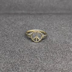 About Item  Item           :- Peace ring Ring size   :- Choose from variation( Custom size accepted) Material   :- 92.5 sterling silver Item Title :- sterling silver "PEACE SIGN" Ring, sterling silver peace ring, silver peace ring, Peace Ring, Silver Ring, Peace silver ring, Gifts for her Description:- We use 925 sterling silver & 14K pure gold to making jewelry. We accept all types of custom & personalized order. Please send us a message if you are interested in a custom creation.  Shipping pro Peace Sign Ring, Peace Ring, Tattoo Nails, N Nails, Jewellery Rings, Hippie Vibes, Bezel Ring, Hippie Jewelry, Dancing Queen