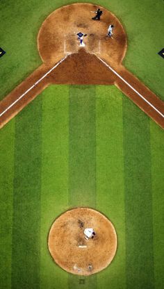 an overhead view of a baseball field with the batter up to plate