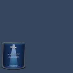 a can of marquee paint on a brown background