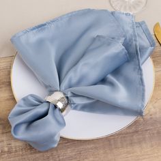 a plate with a napkin and fork on it