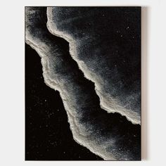 an abstract black and white painting with waves in the water on a dark night sky