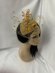 Absolutely beautiful! This is a couture and elegant unique cut design OOAK (one of a kind) vintage 1920 flapper styled pearl beaded with rhinestone jeweled half hat fascinator with metallic gold dotted veil    perfect for weddings, Mother of the Bride hat, Bridal fascinator hat, Church hats, COGIC women convention hats, tea parties, cocktail parties  and special occasion headpiece. Looking for a unique handmade fashion lover gift for women, then this is a perfect gift.  E A S Y  T O  W E A R  Fo Handmade Gold Hat For Kentucky Derby, Vintage Gatsby Style Hat Headpiece, Gatsby Style Hat For Vintage Events, Elegant Mini Hats For Wedding And Carnival, Elegant Gold Headpieces For Vintage Events, Elegant Headpieces For Mardi Gras Evening, Elegant Evening Headpieces For Mardi Gras, Gold Elegant Headpiece For Mardi Gras, Elegant Mardi Gras Evening Headpiece