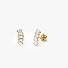 Made to Order
Sold as Single Earring
Gold Kt: 14K
Available Gold Color: Rose Gold, Yellow Gold, White Gold
Length of Bar: 6 MM
Baguette Diamonds: 5 pcs 2.75 x 1.5 
(single)

Total CTW: 0.15 ctw (single)
Diamond Color-Clarity: G Color SI Clarity Formal Gold Earrings With Baguette Diamonds, Luxury Gold Baguette Cut Earrings, Gold Cubic Zirconia Baguette Earrings, 14k Gold Baguette Earrings Fine Jewelry, Fine Jewelry 14k Gold Baguette Earrings, 14k Gold Baguette-cut Diamond Earrings, Gold Baguette Cut Earrings For Evening, Yellow Gold Baguette Diamond Earrings Fine Jewelry, Yellow Gold Baguette Diamond Fine Earrings