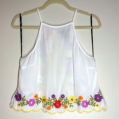 Brand New Beautiful Floral Embroidered White Top - Small. Open Back With Scalloped Edges. Halter Tank Top With Floral Stitching Throughout. Please See Photos For More Details And Aprox. Measurements Women Size Small B 0064 Spring Cotton Crop Top With Floral Embroidery, Spring Vacation Crop Top With Floral Embroidery, Spring Floral Embroidery Cotton Crop Top, Embroidered Hem Top For Summer Vacation, Floral Embroidered Crop Top For Spring, Summer Floral Embroidery Tops For Day Out, Summer Embroidered Cotton Top For Day Out, Summer Floral Embroidered Tops For Day Out, Embroidered Summer Crop Top