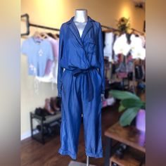 This Stylish Jumpsuit Is Made Of Denim Like Super Soft And Smooth Fabric In Pajamas Style, Slightly Glossy. The Belt Is Detachable But Is Sewn With Few Stitches On One Side Just To Keep It From Losing. Functional Pockets. Brand New With Tag. Jumpsuit Only; All Accessories As Shown In Pics Are For Styling Purpose Only And Are Not Included. Final Sale As Is; Feel Free To Ask Questions Before Purchase. Denim Blue Relaxed Fit Jumpsuits For Day Out, Chic Denim Blue Relaxed Fit Jumpsuit, Relaxed Fit Denim Jumpsuit With Pockets For Loungewear, Blue Long Sleeve Denim Jumpsuit For Summer, Denim Blue Relaxed Fit Jumpsuits And Rompers For Work, Relaxed Fit Denim Blue Jumpsuits For Work, Denim Blue Relaxed Fit Jumpsuits For Workwear, Denim Blue Long Sleeve Jumpsuits And Rompers For Spring, Denim Blue Long Sleeve Jumpsuits For Spring