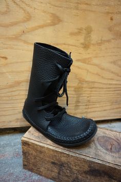 Plain+Shin+High+Moccasin+Black+Hand+Stitched+Thick+Bullhide Knee High Moccasins, Style Black Boots, Earthing Shoes, Guy Clothing, Black Moccasins, Norse Tattoo, Earth Shoes, Moccasin Boots, Leather Moccasins