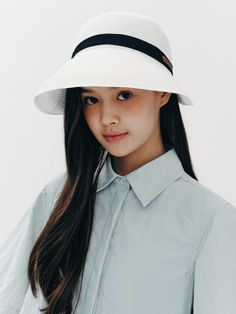 marieclaire, which began in France in 1954, is a brand that has accompanied women around the world in beauty, fashion, and lifestyle. It offers the relaxed mood of everyday life, imbued with a rich French sensibility. - Sun visor hat style- Wide flared brim silhouette- Contrasting tape band with logo patch embellished- Made of durable and lightweight rattan fabric- Self-tie strap at the back Casual White Sun Hat With Upf 50+, Chic Travel Visor Hat, Casual White Sun Hat For Day Out, Chic Visor Sun Hat For Travel, White Short Brim Boater Hat For Travel, White Summer Hats For Everyday Use, White Wide Brim Boater Hat For Travel, White Summer Hats For Everyday Wear, White Wide Brim Panama Hat For Travel