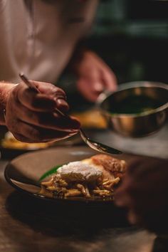 a person is preparing food on a plate