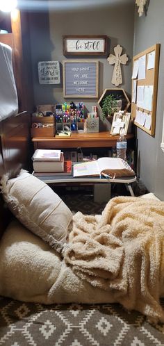 The rug, pillow, blanket, octogon shelf, and letter board are all from Five Below, pen holders are from Dollar Tree, faith cross is from Dollar General, beaded garland is from Hobby Lobby, and everything else came from random places. Bible Reading Corner, College Dorm Room Ideas Christian, Praying Corner At Home, Pray Corner Ideas Christian, Bible Study Desk, Prayer Corner Ideas, Prayer Room Ideas Decor Christian, Prayer Closet Ideas Spaces, Bible Room