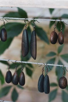 Very special bog oak earrings. Bog oak is oak wood that has been lying in water, river bottom for hundreds and thousands of years.  Earrings have different shapes, that are made with sanding method. Bog Oak Jewelry, Lying In Water, Birch Earrings, Wooden Peace Sign, Hundreds And Thousands, Water River, Wooden Flag, Wooden Bead Garland, Wooden Cake