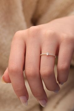 "14k & 18k Baguette Diamond Band / Half Eternity Baguette Diamond Ring / Gold Diamond Minimalist Ring Available in Gold,Rose Gold,White Gold ❥ ITEM DETAILS ---> Gold Color of Choice : Yellow Gold, Rose Gold, White Gold ---> Material : 14k ( 585 ) or 18k ( 750 ) Real Gold. It is Not Gold Filled or Gold Plated ---> Made to order ---> Band Thickness : 1.25 mm ---> Band Width : 1.20 mm ---> Clarity : H color VS/SI ---> Diamond Cut: Round & Baguette ---> Number of Ston Dainty Emerald Cut Diamond Ring With Baguette Diamonds, Minimalist Baguette Cubic Zirconia Jewelry, Elegant Everyday Emerald Cut Diamond Ring, Minimalist Rose Gold Baguette Diamond Rings, 14k Gold Baguette Jewelry, Baguette Rings For Gift, Elegant Everyday Diamond Ring With Baguette Diamonds, Dainty Gold Baguette Cut Diamond Ring, Dainty Emerald Cut Diamond Ring In Rose Gold